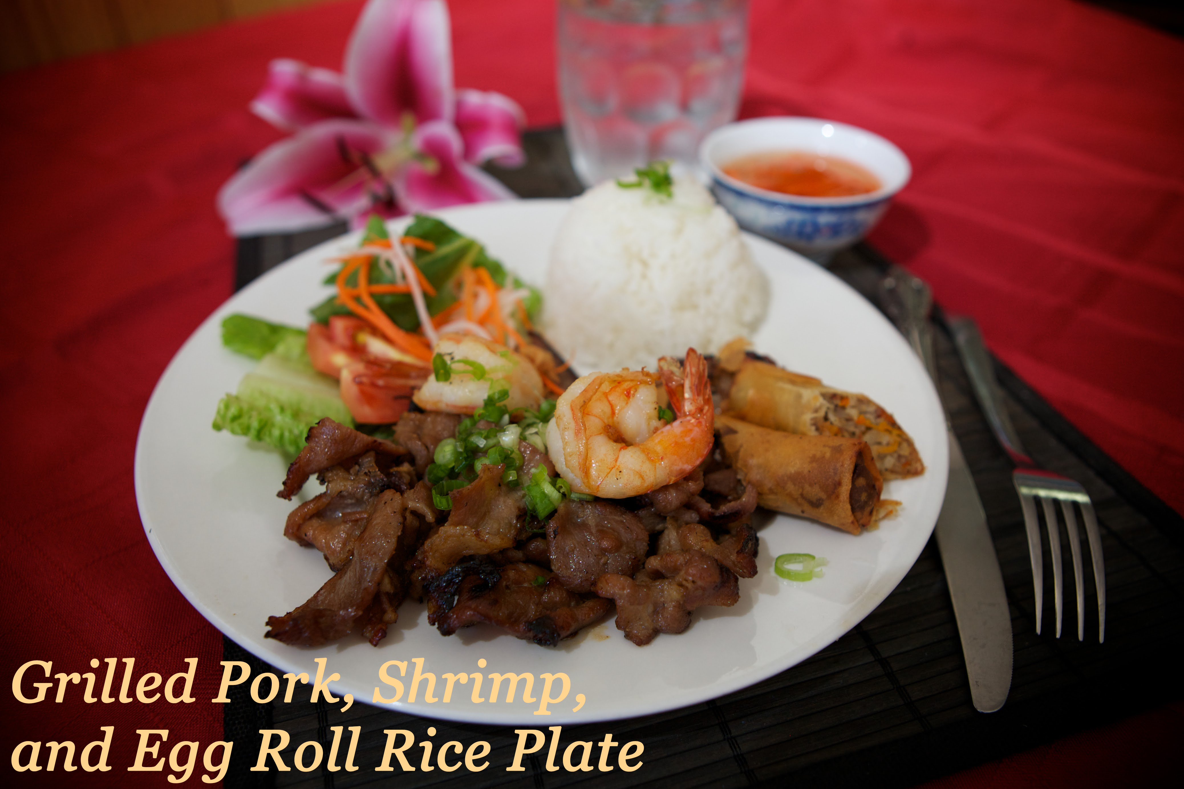 Grilled Pork, Shrimp, and Egg Roll Rice Plate Vietnamese cuisine